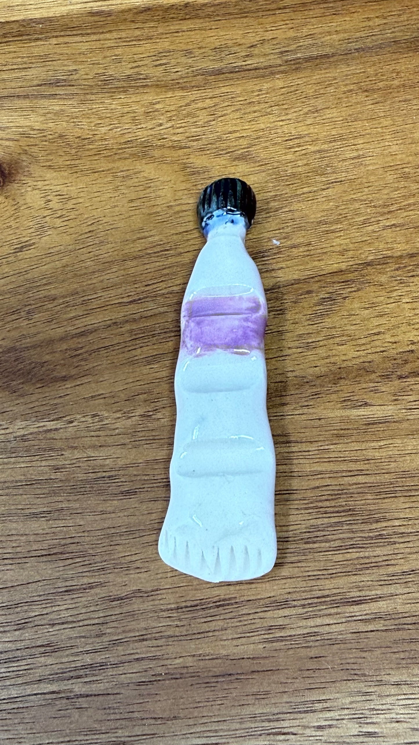 Paint tube brush rest