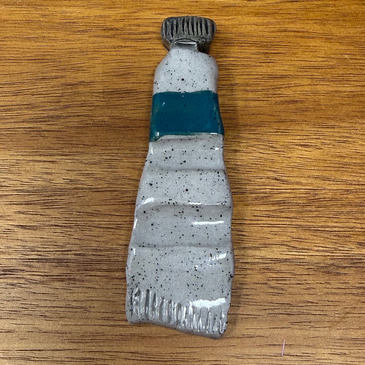Gray tube brush rests