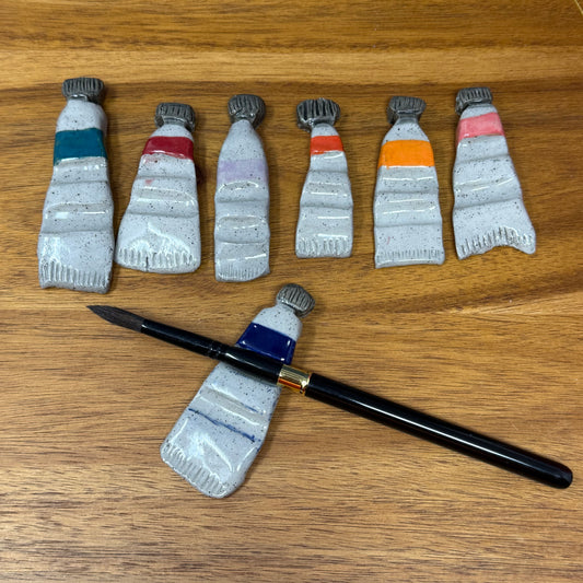 Gray tube brush rests